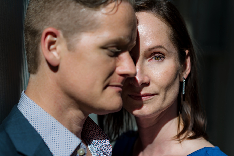 A portrait of an engaged couple in full sun.